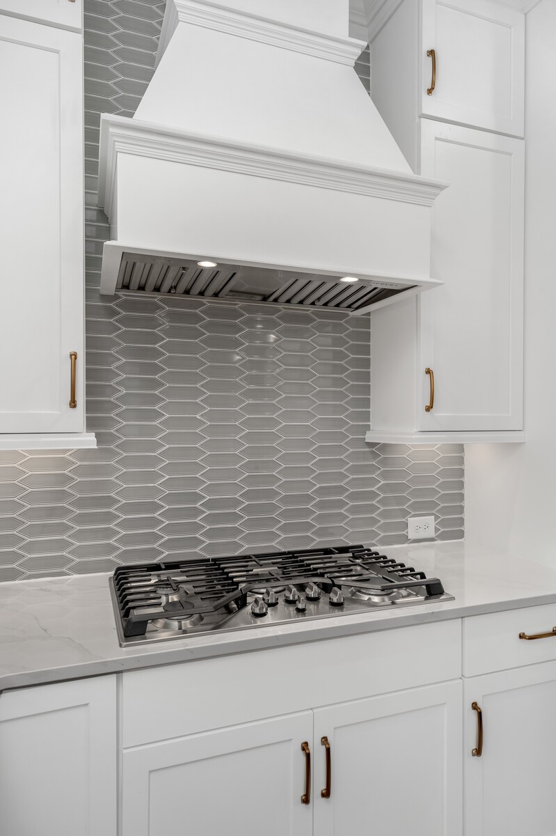 844 Horizon Drive Franklin, TN 37064 - Photo 12 of 48 a stove top oven sitting inside of a kitchen