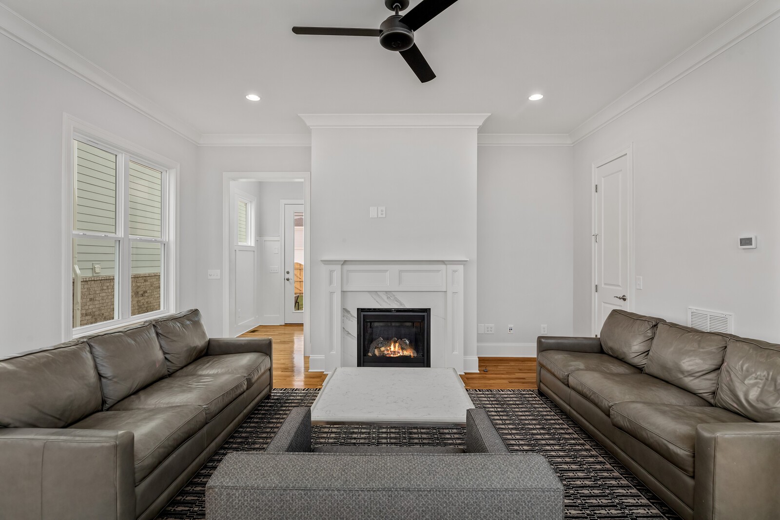 844 Horizon Drive Franklin, TN 37064 - Photo 16 of 48 a living room with furniture and a fireplace
