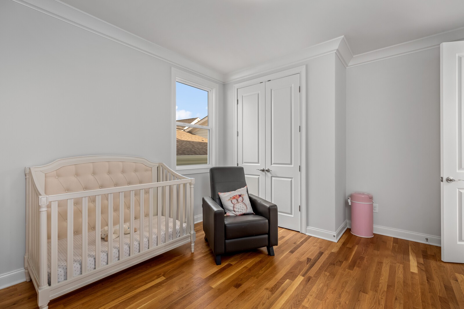 844 Horizon Drive Franklin, TN 37064 - Photo 34 of 48 a bedroom with a bed and wooden floor