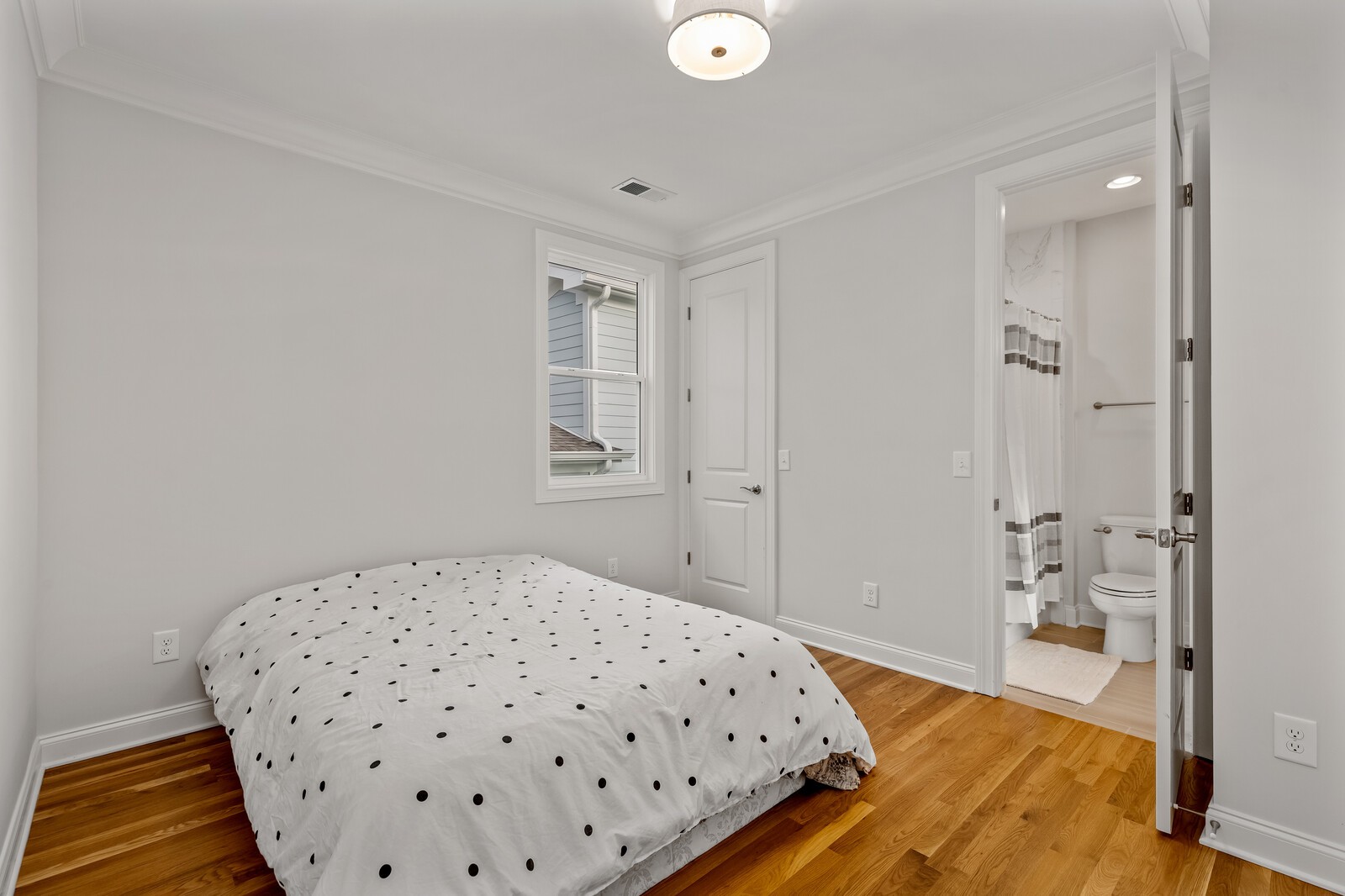 844 Horizon Drive Franklin, TN 37064 - Photo 37 of 48 a bedroom with a bed and a view of bathroom