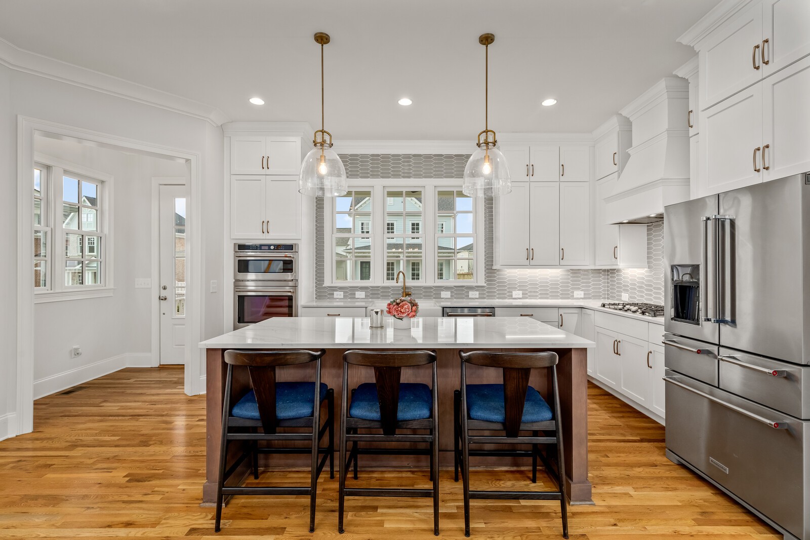 844 Horizon Drive Franklin, TN 37064 - Photo 7 of 48 a kitchen with stainless steel appliances a dining table chairs and wooden floor