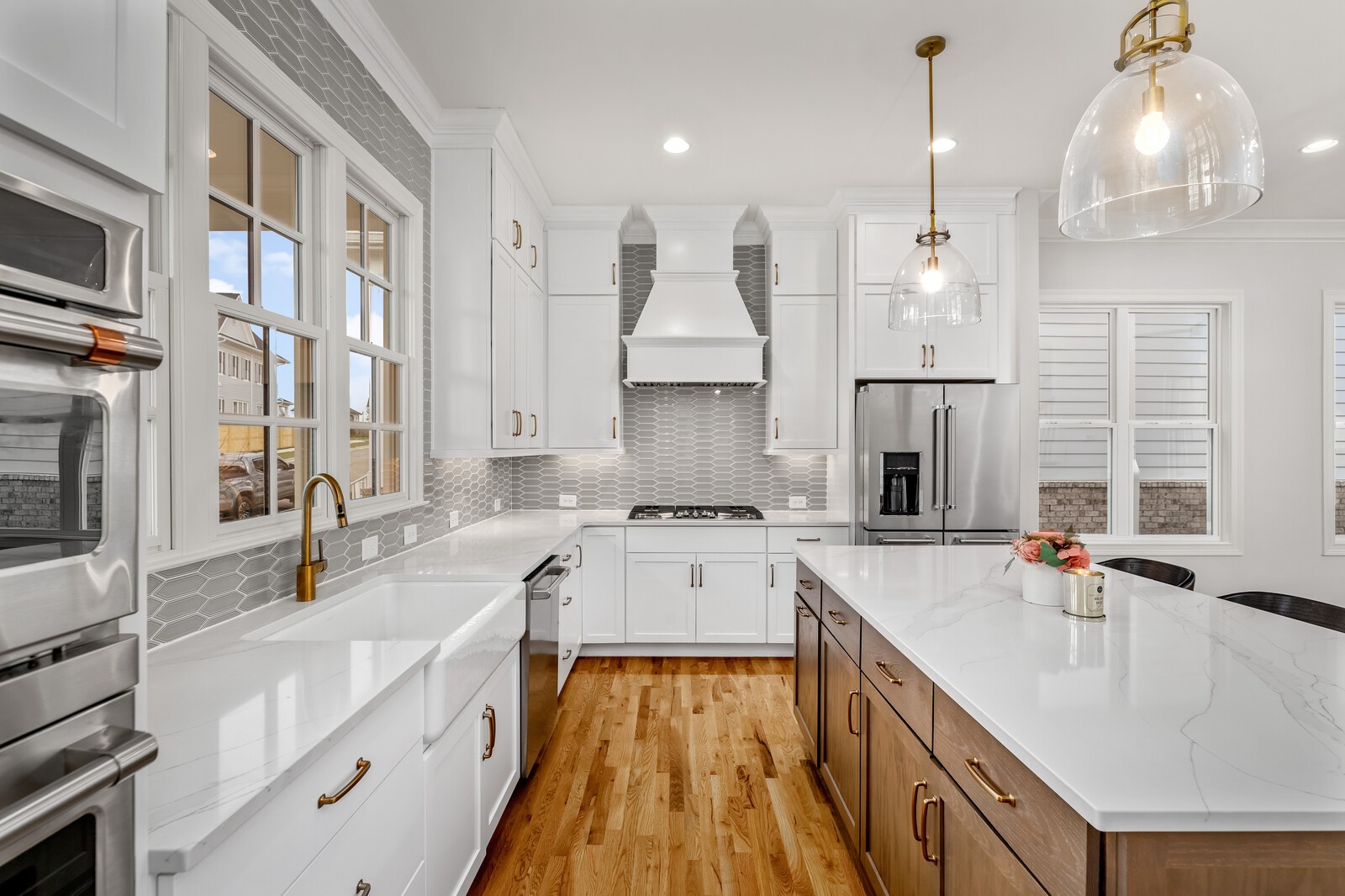 844 Horizon Drive Franklin, TN 37064 - Photo 9 of 48 a large kitchen with stainless steel appliances granite countertop a sink stove and refrigerator