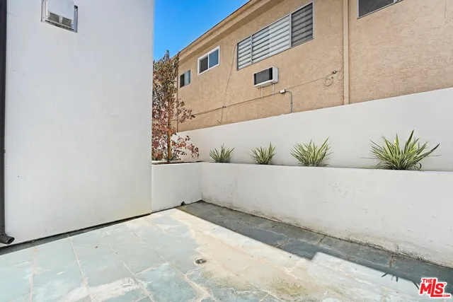 a white bath tub sitting in a bathroom
