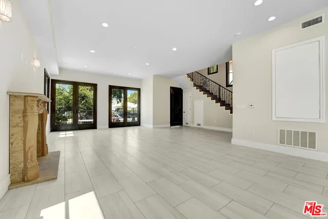 a view of an entryway with stairs