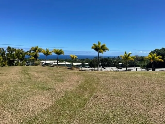 a view of a lake with a house