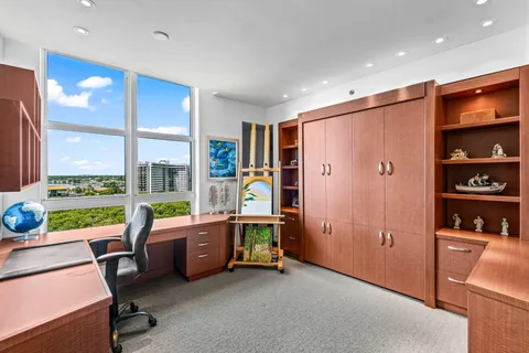 a room with sink and mirror