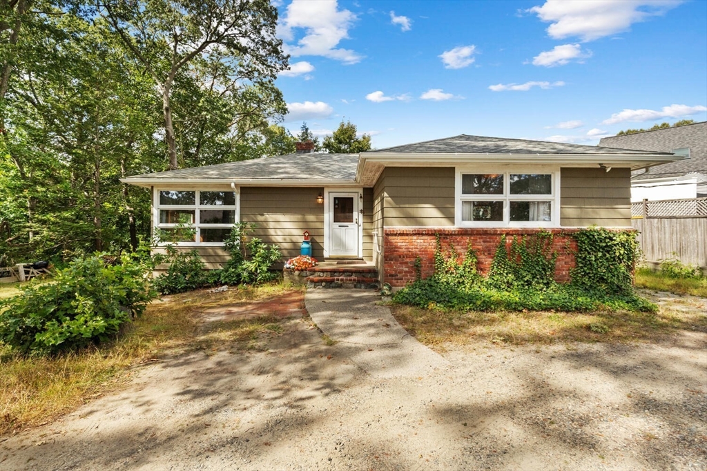 8 Everett Street Wakefield, MA 01880 - Photo 1 of 32 a front view of a house with garden