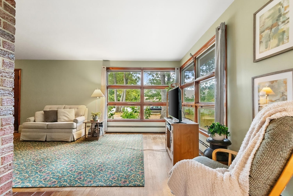 8 Everett Street Wakefield, MA 01880 - Photo 13 of 32 a living room with furniture and a large window