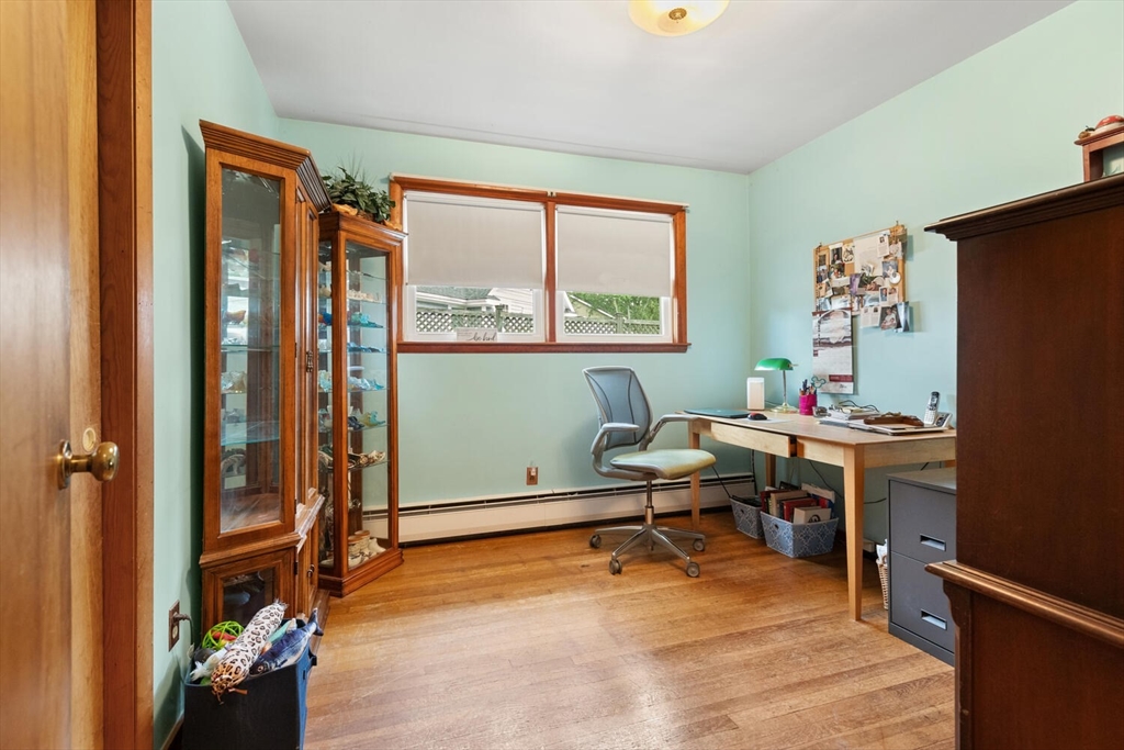 8 Everett Street Wakefield, MA 01880 - Photo 25 of 32 a workspace with furniture and a window