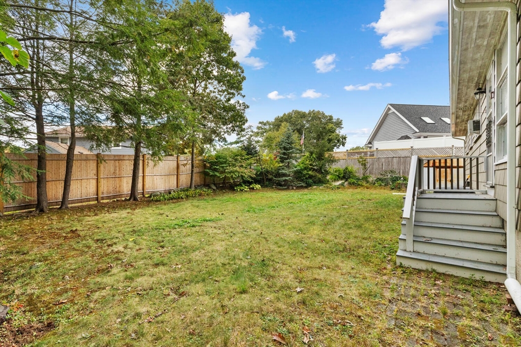 8 Everett Street Wakefield, MA 01880 - Photo 32 of 32 a view of a house with a yard