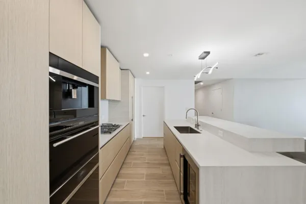 a large kitchen with cabinets