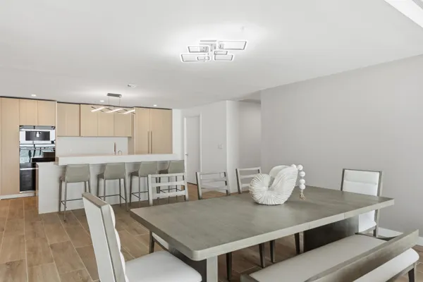 a utility room with sink washer and dryer
