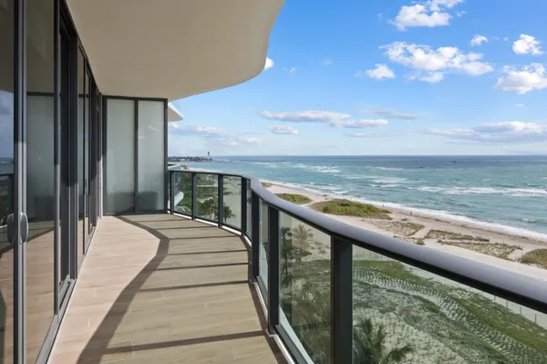 a balcony with view of ocean