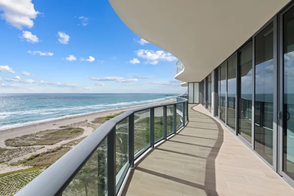 a view of swimming pool with outdoor seating