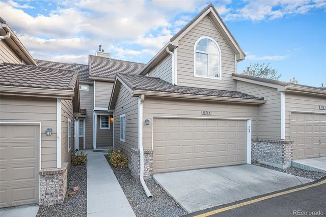 a view of house with garage