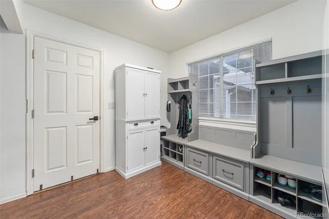 a kitchen with stainless steel appliances a refrigerator and cabinets