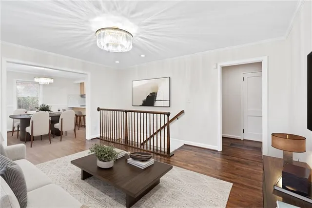 a living room with furniture and a table