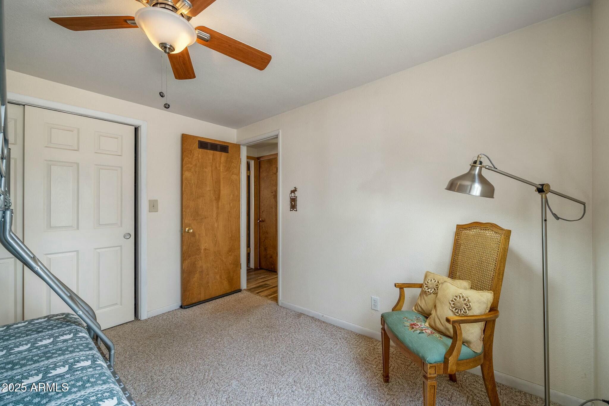 2061 Cherokee Strip Road Overgaard, AZ 85933 - Photo 17 of 40 a view of a room with gym equipment