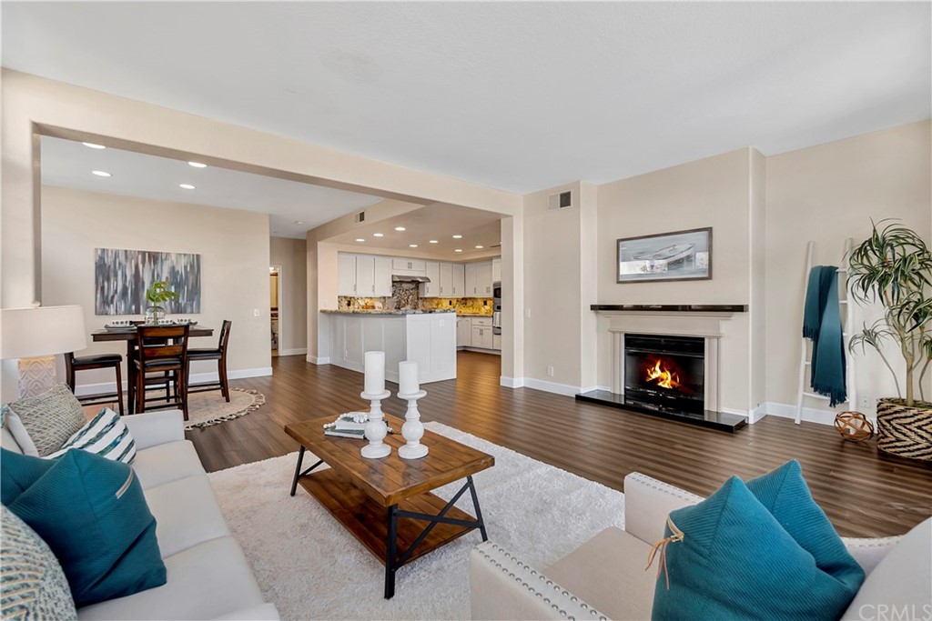 3171 Diamond View Street Corona, CA 92882 - Photo 14 of 59 a living room with furniture and a fireplace