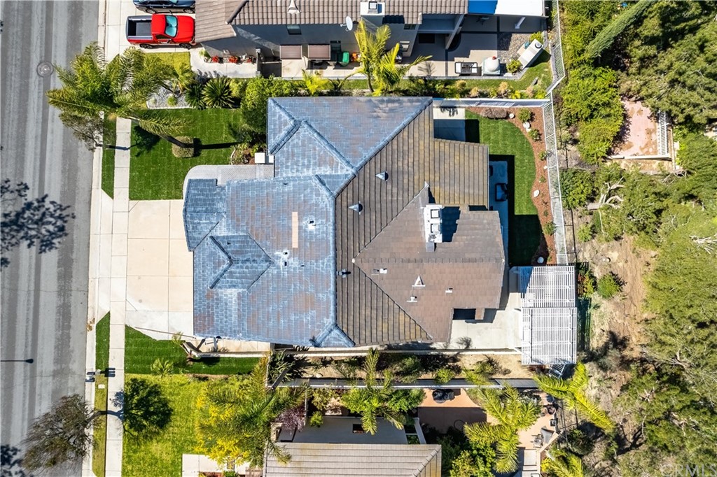 3171 Diamond View Street Corona, CA 92882 - Photo 25 of 59 an aerial view of multiple houses with yard