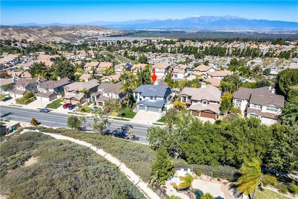3171 Diamond View Street Corona, CA 92882 - Photo 26 of 59 an aerial view of residential houses with outdoor space