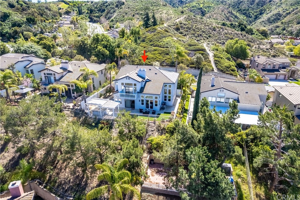 3171 Diamond View Street Corona, CA 92882 - Photo 27 of 59 an aerial view of residential houses with outdoor space and trees