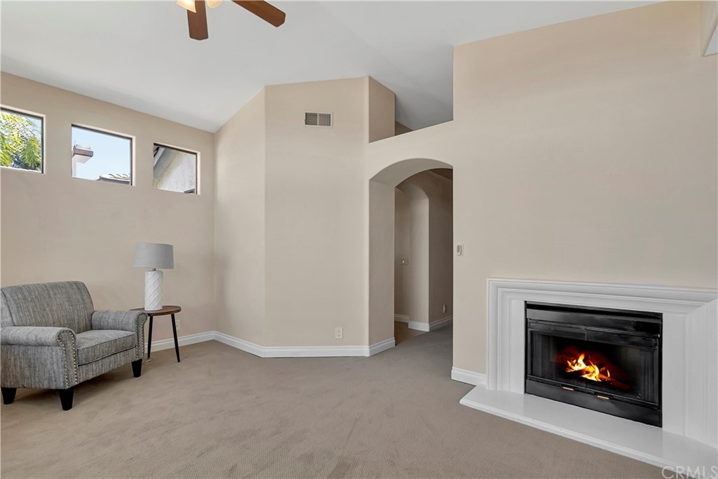 3171 Diamond View Street Corona, CA 92882 - Photo 30 of 59 a living room with furniture and a fireplace