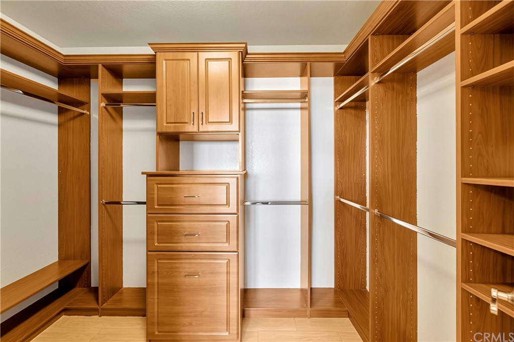 3171 Diamond View Street Corona, CA 92882 - Photo 37 of 59 a view of walk in closet with empty racks