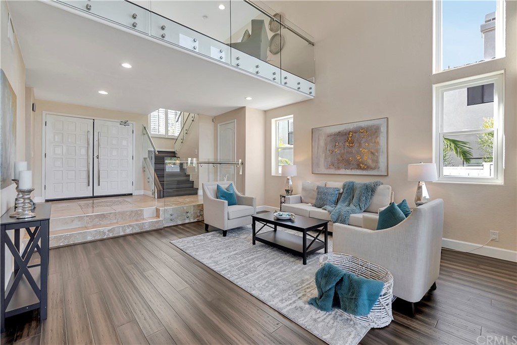 3171 Diamond View Street Corona, CA 92882 - Photo 5 of 59 a living room with furniture and a wooden floor