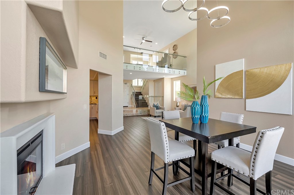 3171 Diamond View Street Corona, CA 92882 - Photo 7 of 59 a view of a dining room with furniture and wooden floor