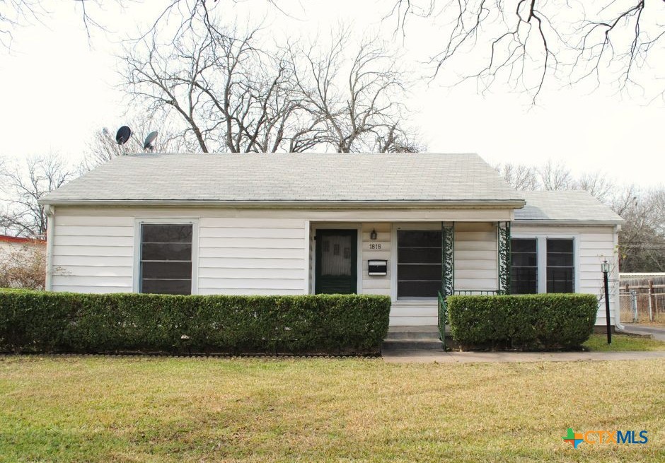 1818 South 35th Street Temple, TX 76504 - Photo 1 of 1 a view of a house with roof and a tree