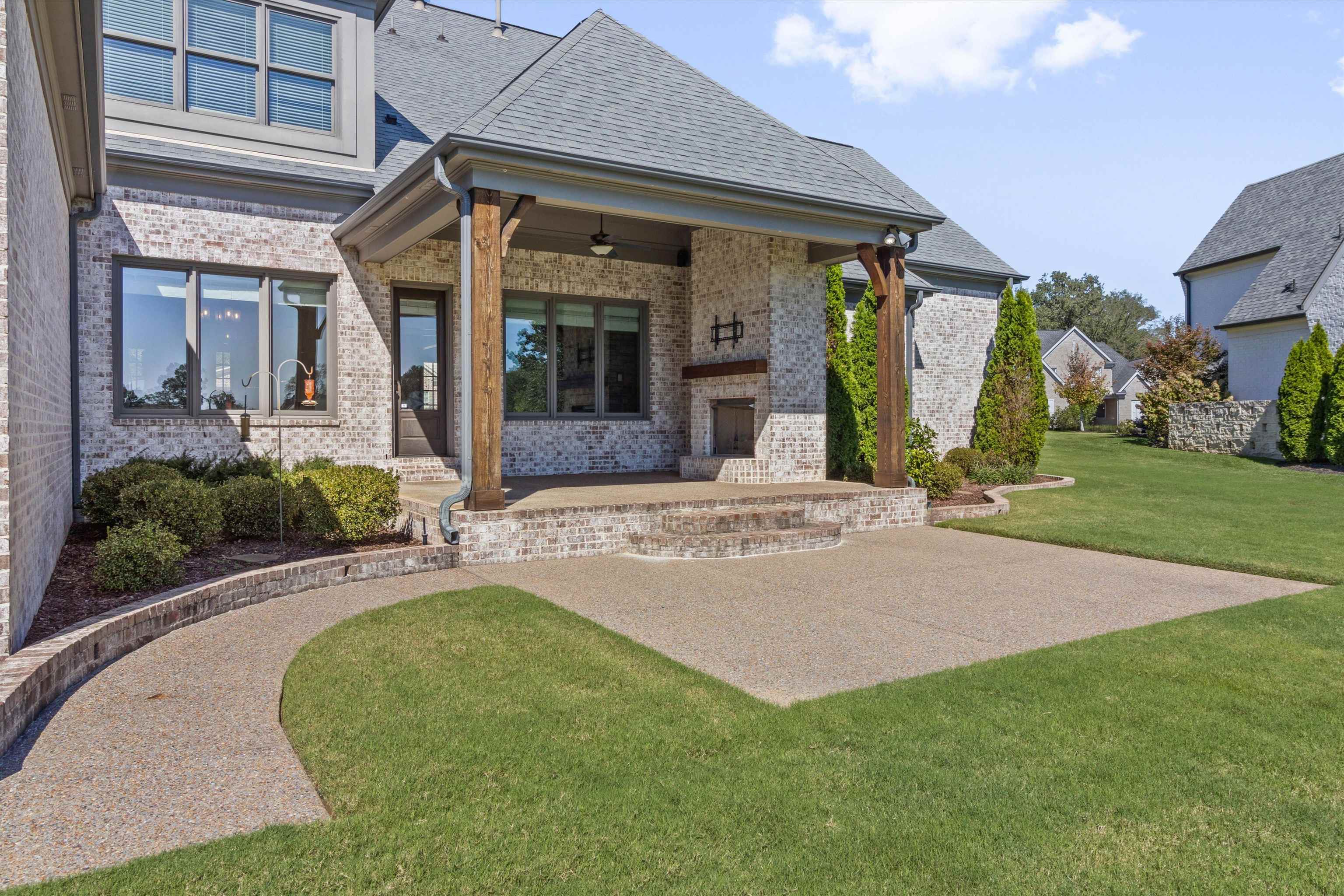 680 Magnolia Lane Piperton, TN 38017 - Photo 36 of 40 a front view of a house with garden