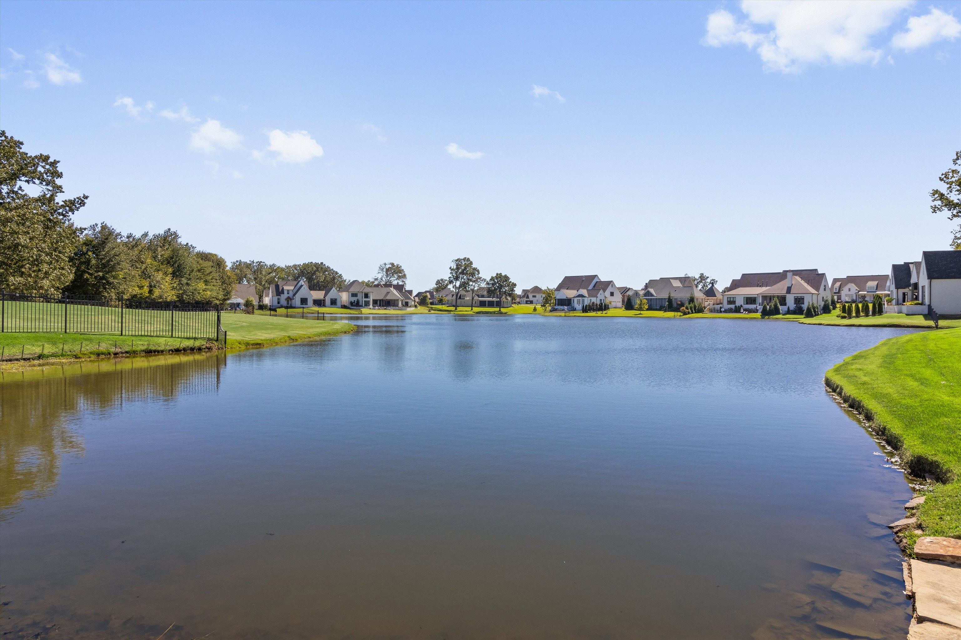 680 Magnolia Lane Piperton, TN 38017 - Photo 38 of 40 a view of a lake with houses in the back
