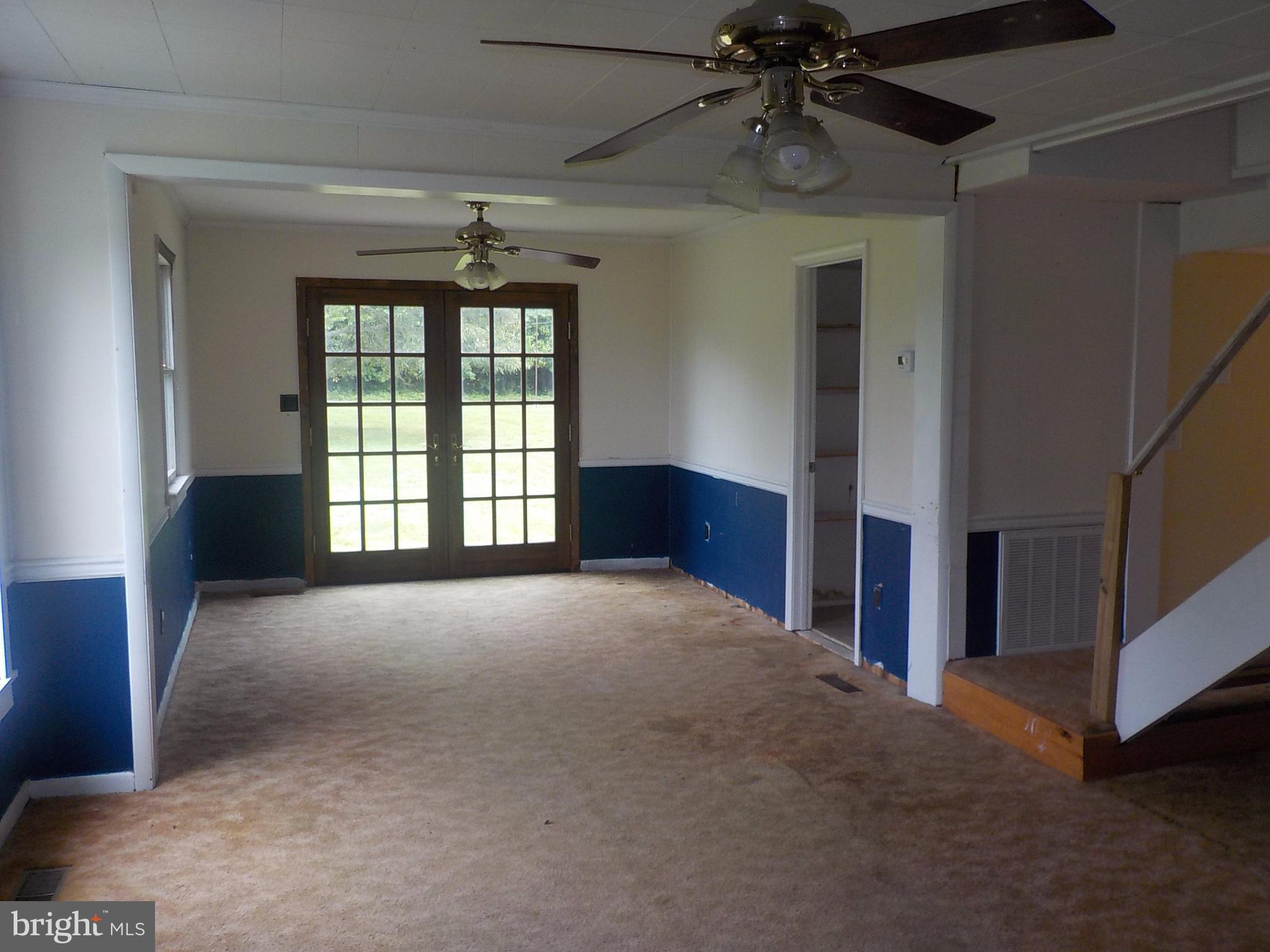 30515 Deep Branch Road Trappe, MD 21673 - Photo 4 of 18 Living room with French doors to patio