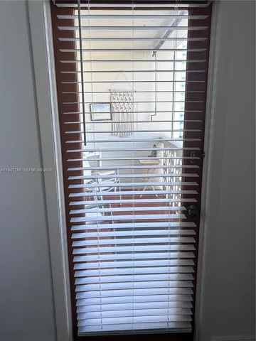 a view of a window and a door