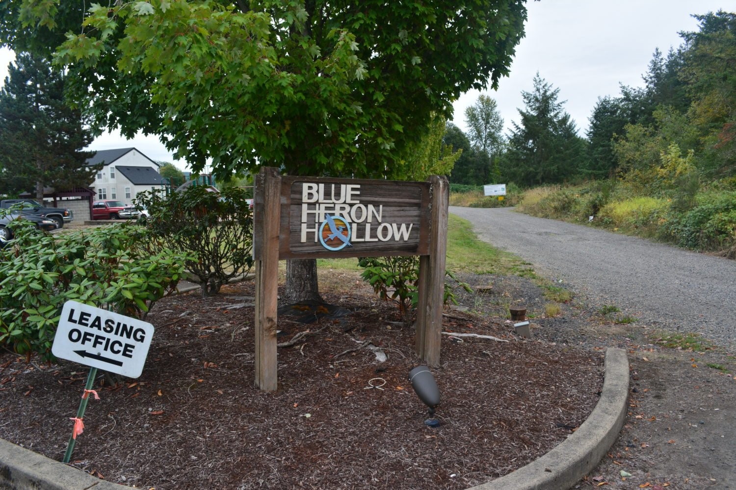 600 California Avenue Vernonia, OR 97064 - Photo 3 of 7 a sign that is sitting in the middle of a forest