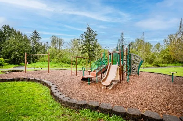 a view of a park with swings
