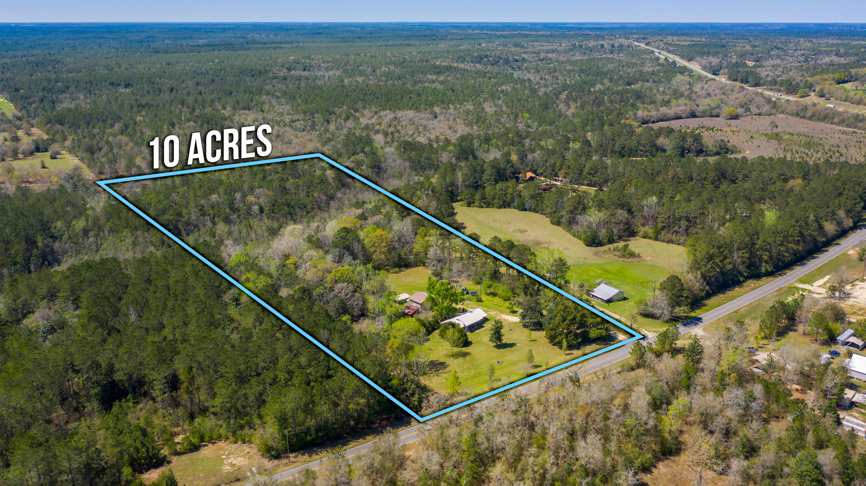 1606 Boy Scout Road DeFuniak Springs, FL 32435 - Photo 2 of 33 a view of a tennis court