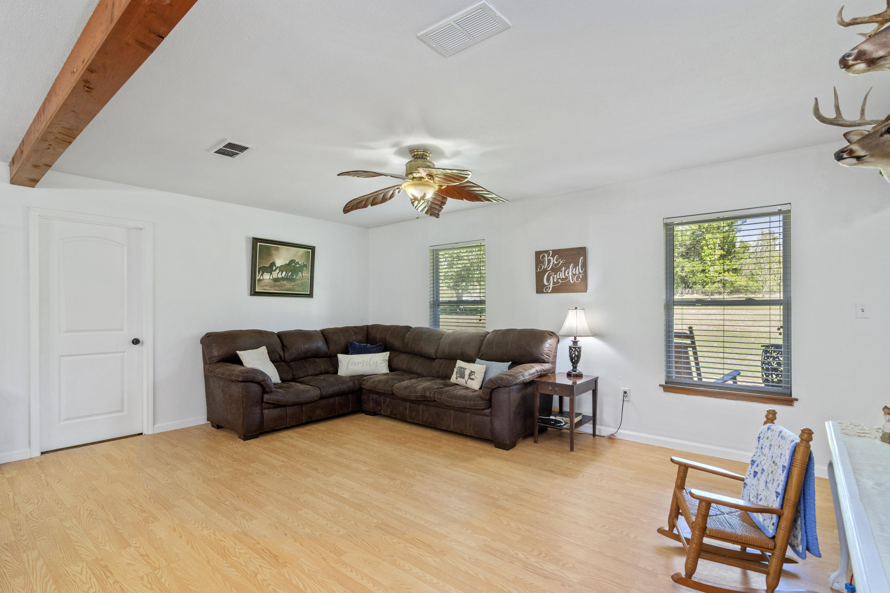1606 Boy Scout Road DeFuniak Springs, FL 32435 - Photo 15 of 33 a living room with furniture and a window