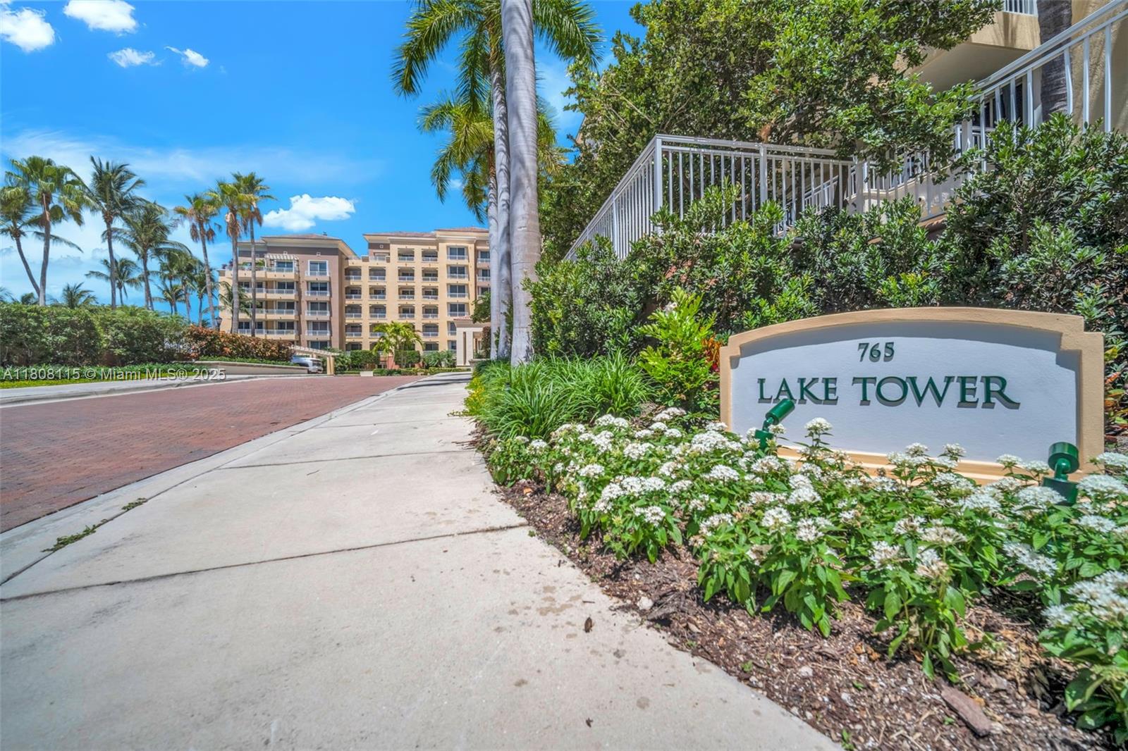 765 Crandon Boulevard, Unit 109 Key Biscayne, FL 33149 - Photo 20 of 21 a view of a street with potted plants