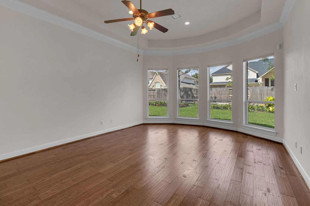 7306 Starflower Katy, TX 77494 - Photo 27 of 50 wooden floor in an empty room with a window