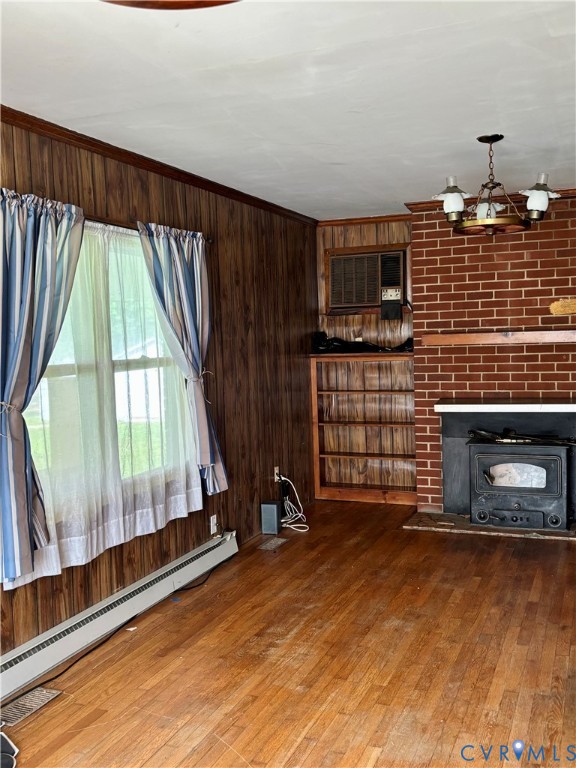 3246 Tabscott Road Columbia, VA 23038 - Photo 13 of 26 a view of an empty room with wooden floor and a window