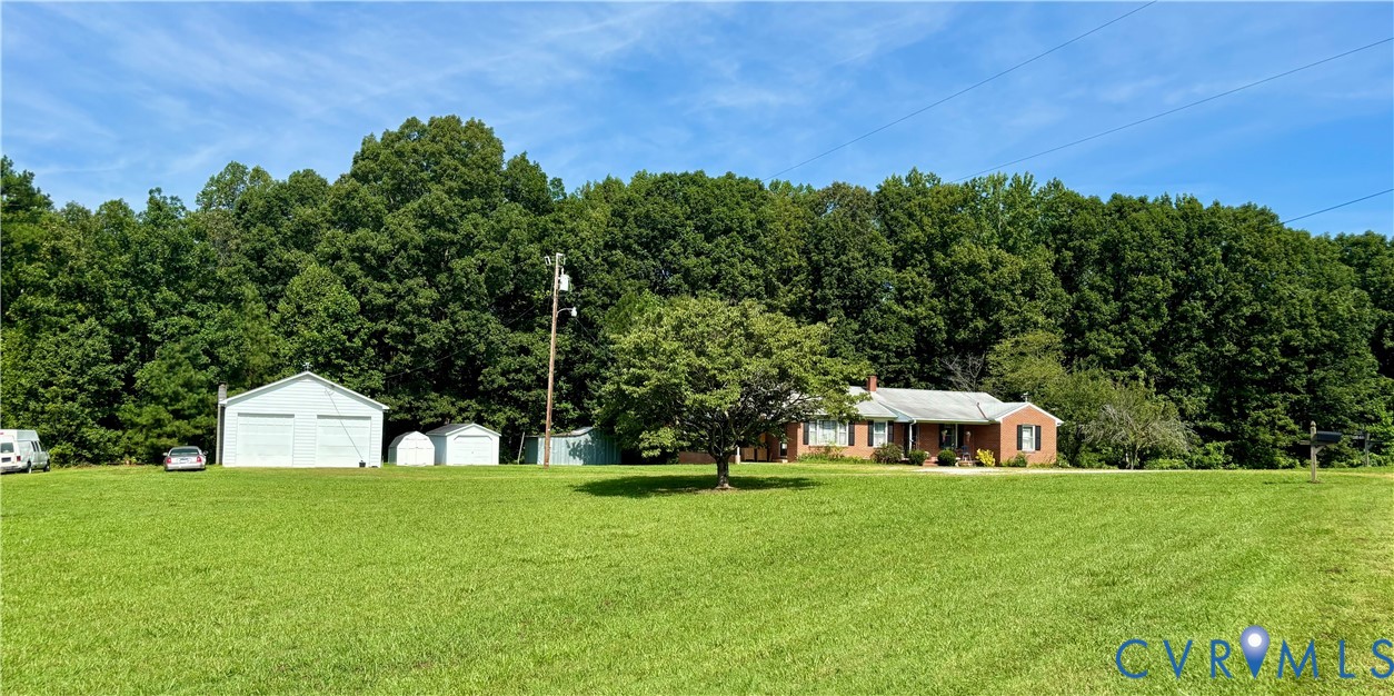 3246 Tabscott Road Columbia, VA 23038 - Photo 2 of 26 a view of a house with a yard