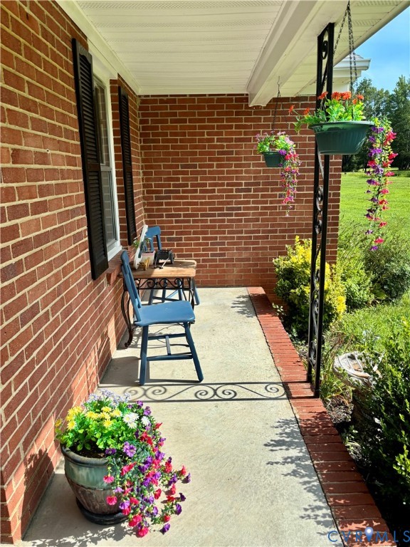 3246 Tabscott Road Columbia, VA 23038 - Photo 3 of 26 a view of a chairs and table in a patio