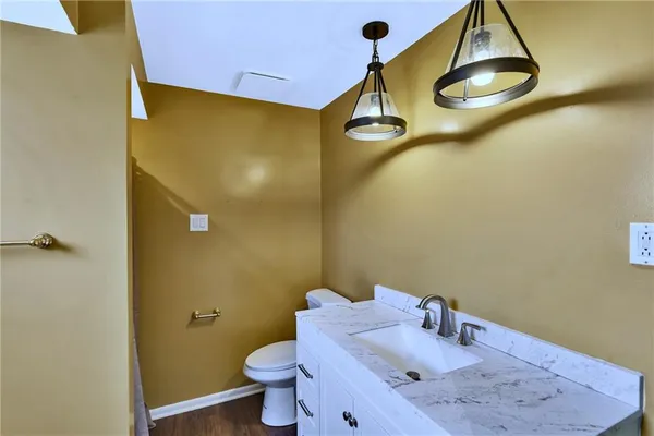 a bathroom with a sink and a toilet