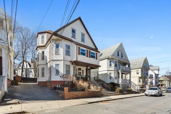 a front view of a building with street view