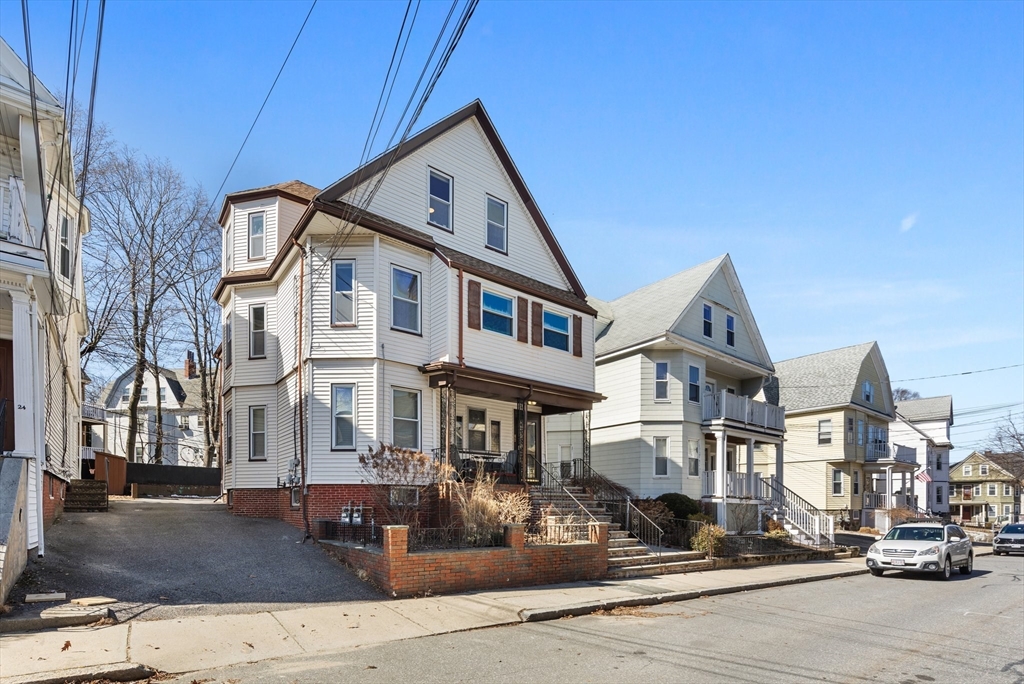 28 Pearson Road, Unit 1 Somerville, MA 02144 - Photo 15 of 18 a front view of a building with street view
