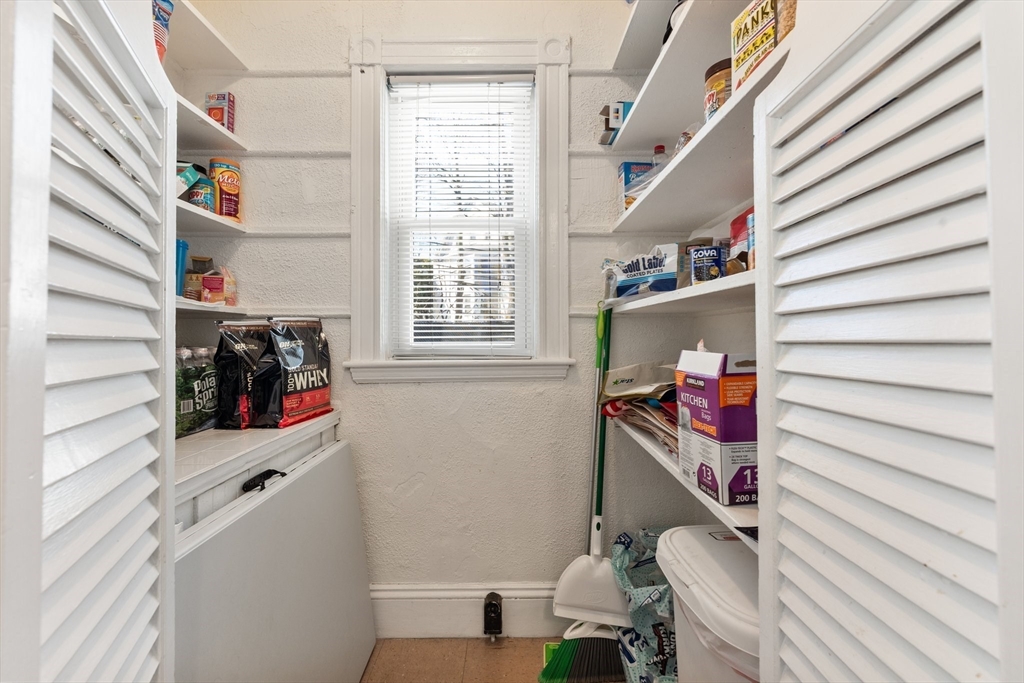 28 Pearson Road, Unit 1 Somerville, MA 02144 - Photo 5 of 18 a view of stairs and an empty room