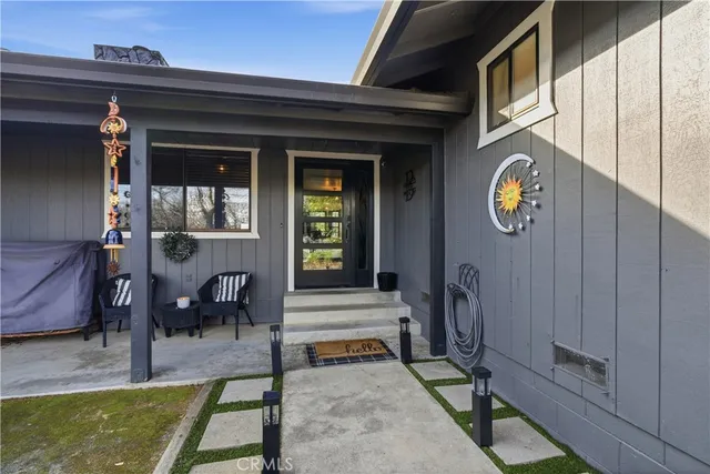a view of living room kitchen with furniture and rug