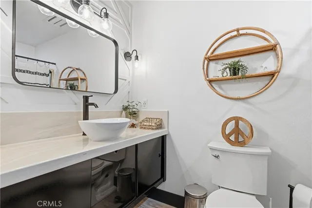 a bathroom with a toilet and a sink